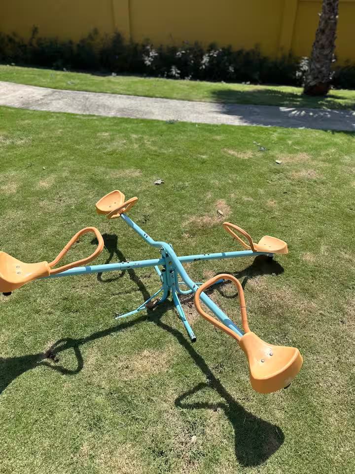 Seesaw on the grass in the shared play area